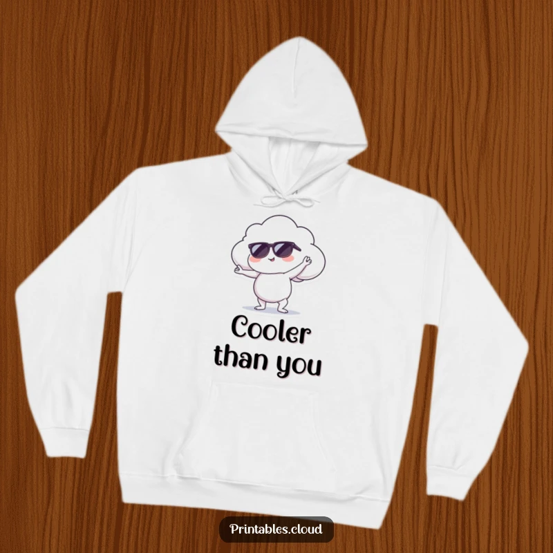 Funny hoodie featuring a sunglasses-wearing cloud in a yoga pose, offering warmth and a symbol of peaceful, cool relaxation.