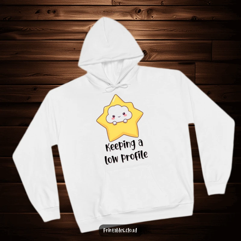 Funny hoodie with a shy cloud character hiding behind a large star, offering warmth and a touch of humorous sweetness.