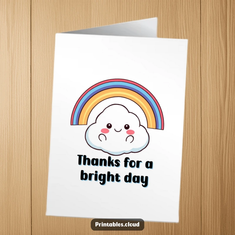 Funny Free Printable Thank You Card: a happy cloud floats under a rainbow, expressing cheerful gratitude. Ideal DIY gift.