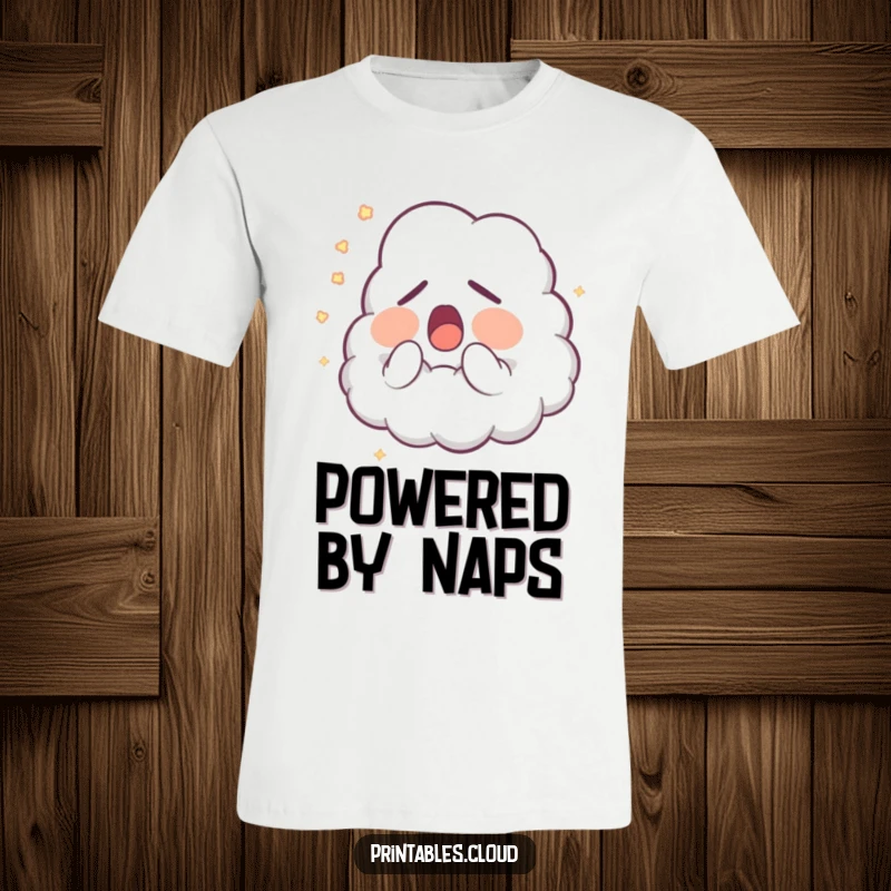 Funny T-Shirt: A cute sleepy cloud character is caught mid-yawn, emitting a gentle trail of glowing dust, making it a humorous apparel choice.